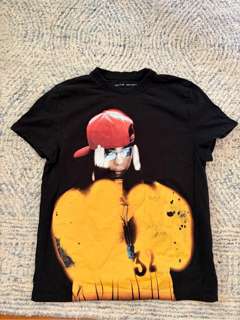 Black Graphic Short-Sleeve Tee with Red Cap and Yellow Print